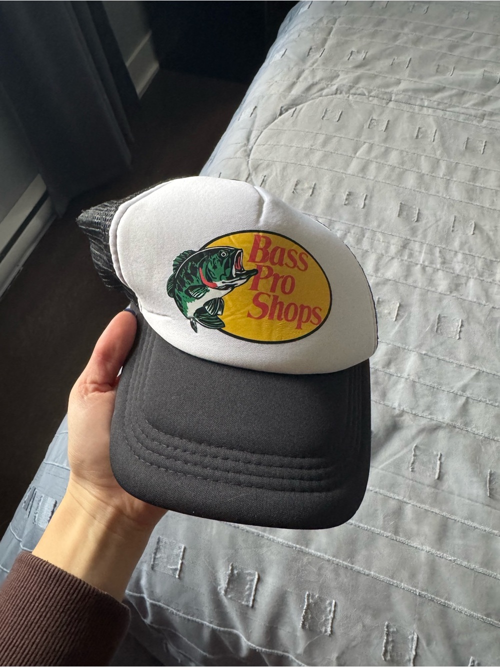 Bass Pro Shops White Front Black Bill Trucker Hat with Yellow Logo